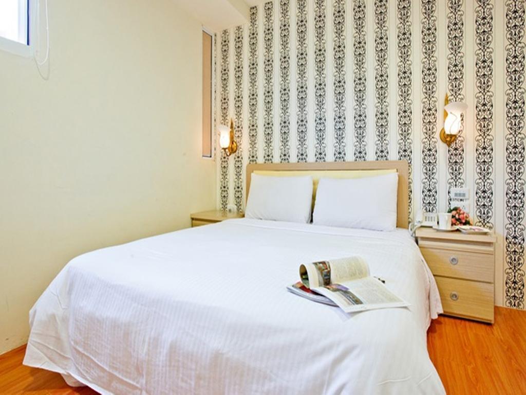 Green Park Commercial Hotel Tainan Habitación foto